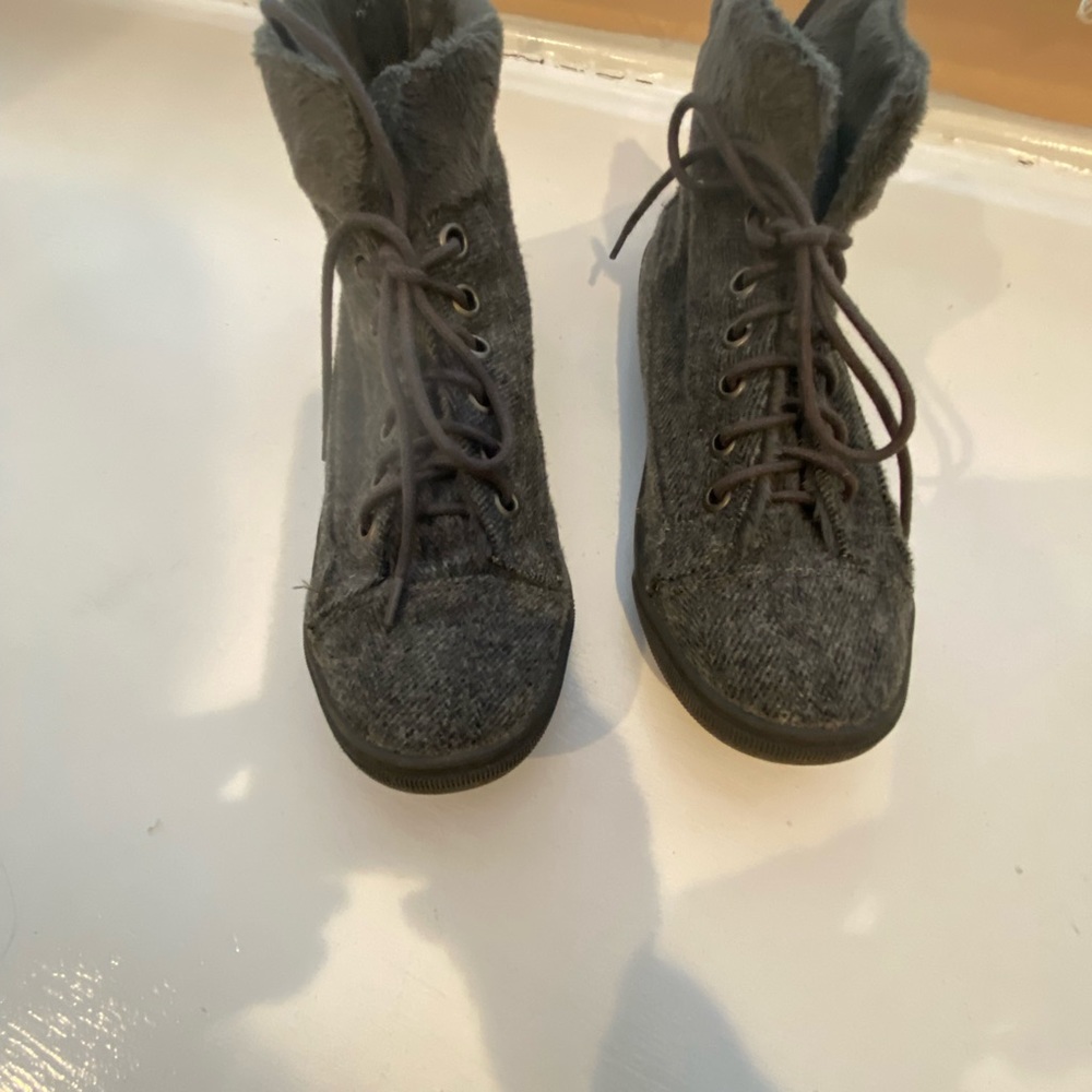 Gray fabric booties , zippered back, laces in front.